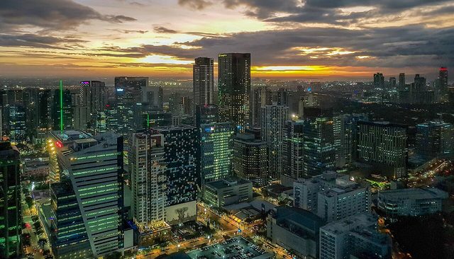 The Bonifacio Global City and Makati skylines at sunset
