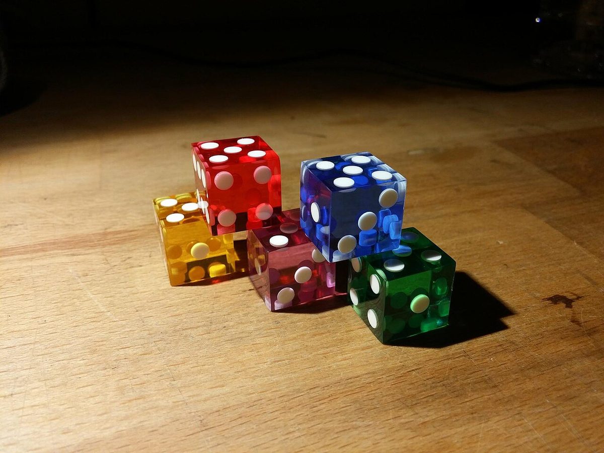 Casino dice on the felt of a gaming table